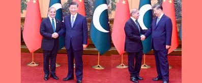 PM Muhammad Shehbaz Sharif shakes hand with Chinese President Xi Jinping
